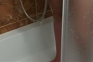 Petite horny teen caught masturbating in the shower